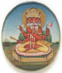 A 19th-century roundel of Brahma, depicts him as a four-headed, red-complexioned aged man, who holds the Vedas, a ladle and a lotus in his hands.